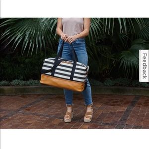 Large black and white striped weekender bag with faux leather zip bottom NWT